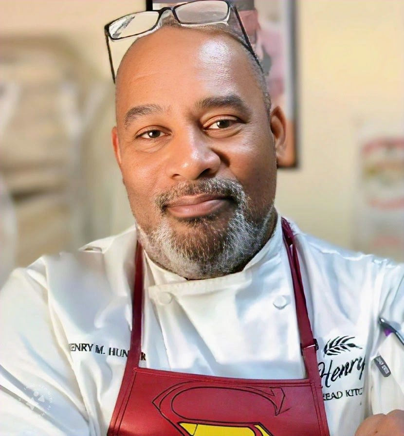 Henry Hunter, baker and author, in his white chef coat and apron